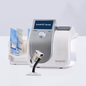 BreathID HpLab breath testing device with mouthpiece and tubing on a white surface