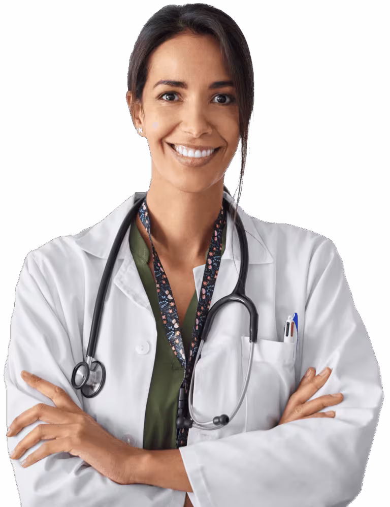 Female doctor in a white coat with a stethoscope, arms crossed, smiling at the camera.