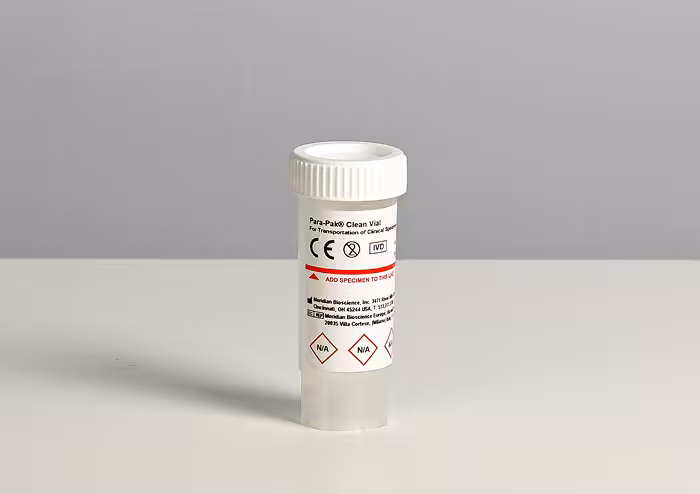 White prescription pill bottle with a child-resistant cap on a white surface, showing a warning-labeled label.
