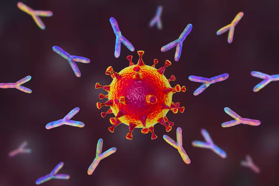 Colorful illustration of a virus particle with spike proteins surrounded by rainbow-colored antibodies.